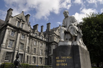 Low angle view of statue against sky