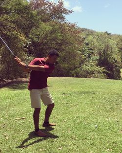 Full length of woman standing on grass
