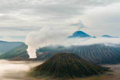 Panoramic view of volcanic landscape against sky