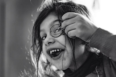 Close-up portrait of girl at home