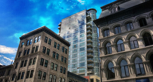 Low angle view of modern building against sky