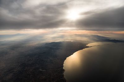 Aerial view of landscape against sky during sunset