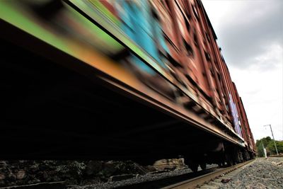 Low angle view of train against sky