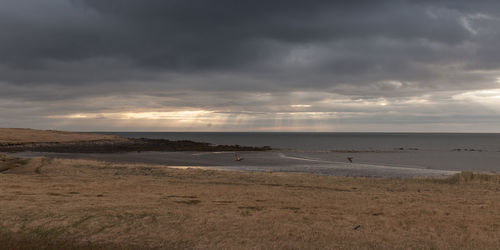 Scenic view of beach against sky