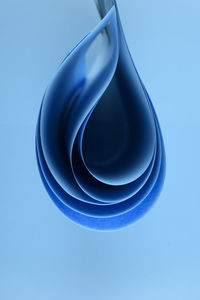 Close-up of water against blue background