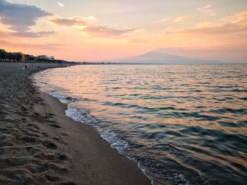 Scenic view of sea against sky during sunset