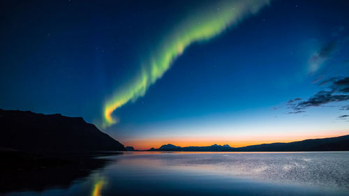 Scenic view of sea against sky at night