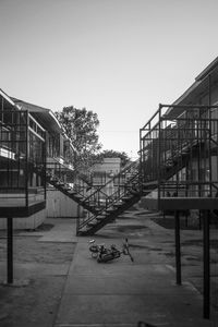 Staircase in city against clear sky