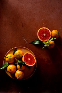 High angle view of fruits in bowl on table