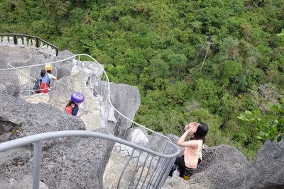 High angle view of people at masungi georeserve against trees in rizal