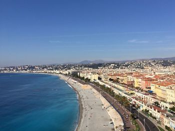 High angle view of sea and buildings against sky nice promenade des anglais