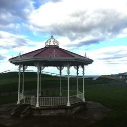 Gazebo against cloudy sky