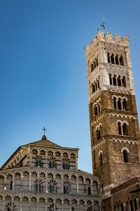 Low angle view of a building against blue sky