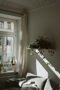 Flower vase on table at home