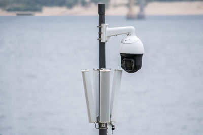 Surveillance camera in the area, street security, face recognition. security system