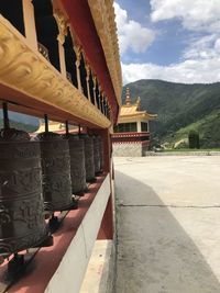 View of temple against buildings