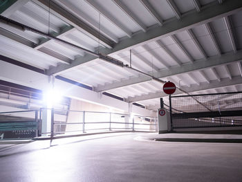 Empty road in illuminated building