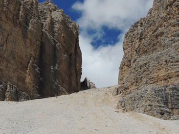 Rock formations on mountain against sky