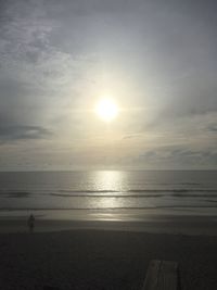 Scenic view of sea against sky at sunset