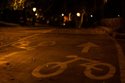 Text on road at night