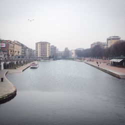 River by city against clear sky