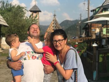 Family on footpath at mokra gora during sunny day