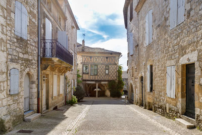 Monflanquin, france - october 17, 2021 architectural detail of typical houses in the city center