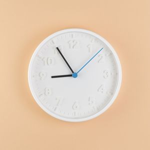 Close-up of clock on wall