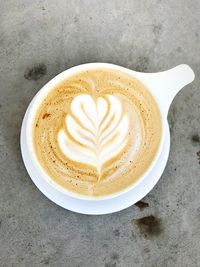 Close-up of cappuccino on table