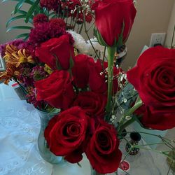 Close-up of red rose in vase