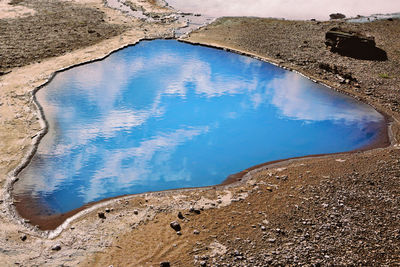 High angle view of sea shore against sky