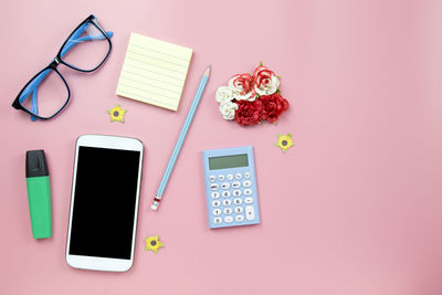 High angle view of smart phone on table