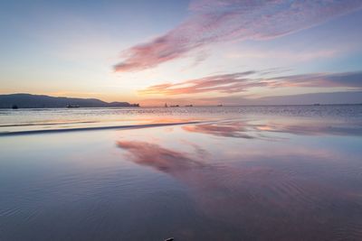 View of beach at sunset