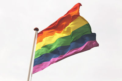 Low angle view of flag against sky