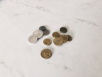 High angle view of coins