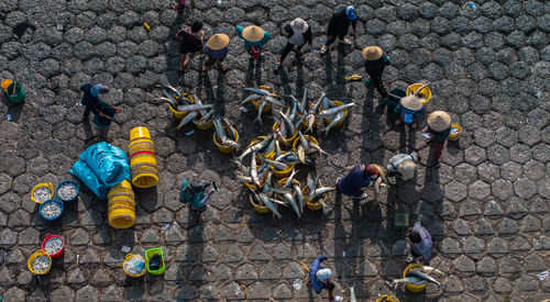 High angle view of people walking on street