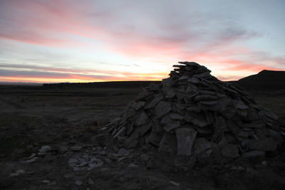 Scenic view of landscape at sunset