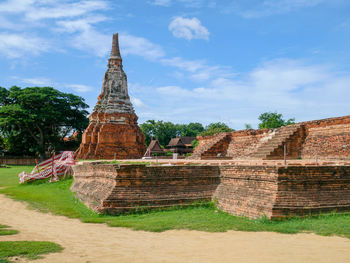 View of temple against cloudy sky