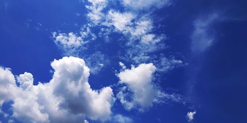 Low angle view of clouds in blue sky