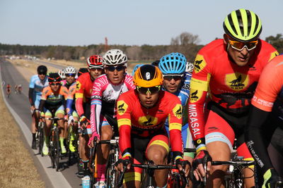 Group of people riding bicycle