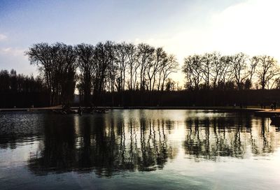 Scenic view of lake at sunset