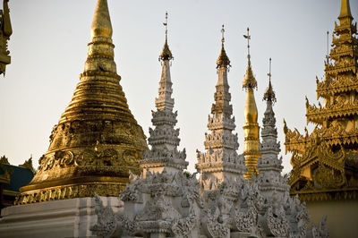 Low angle view of shwedagon pagoda against sky