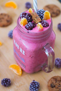 High angle view of fruits in jar on table