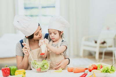 Midsection of woman preparing food