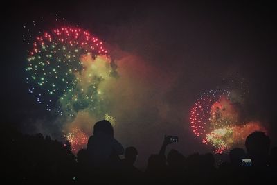 Firework display at night