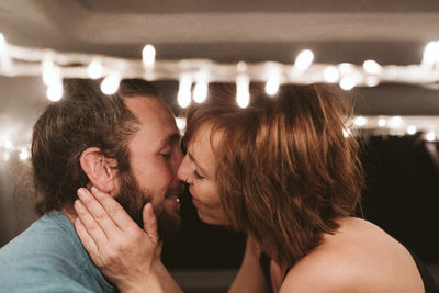 Portrait of couple kissing