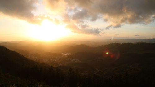 Scenic view of landscape against sky during sunset