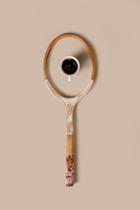 Directly above shot of coffee cup against white background