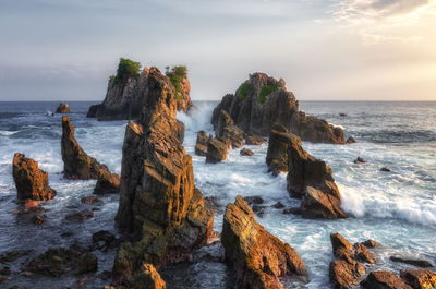 Panoramic view of sea against sky during sunset