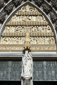 Low angle view of statue against building